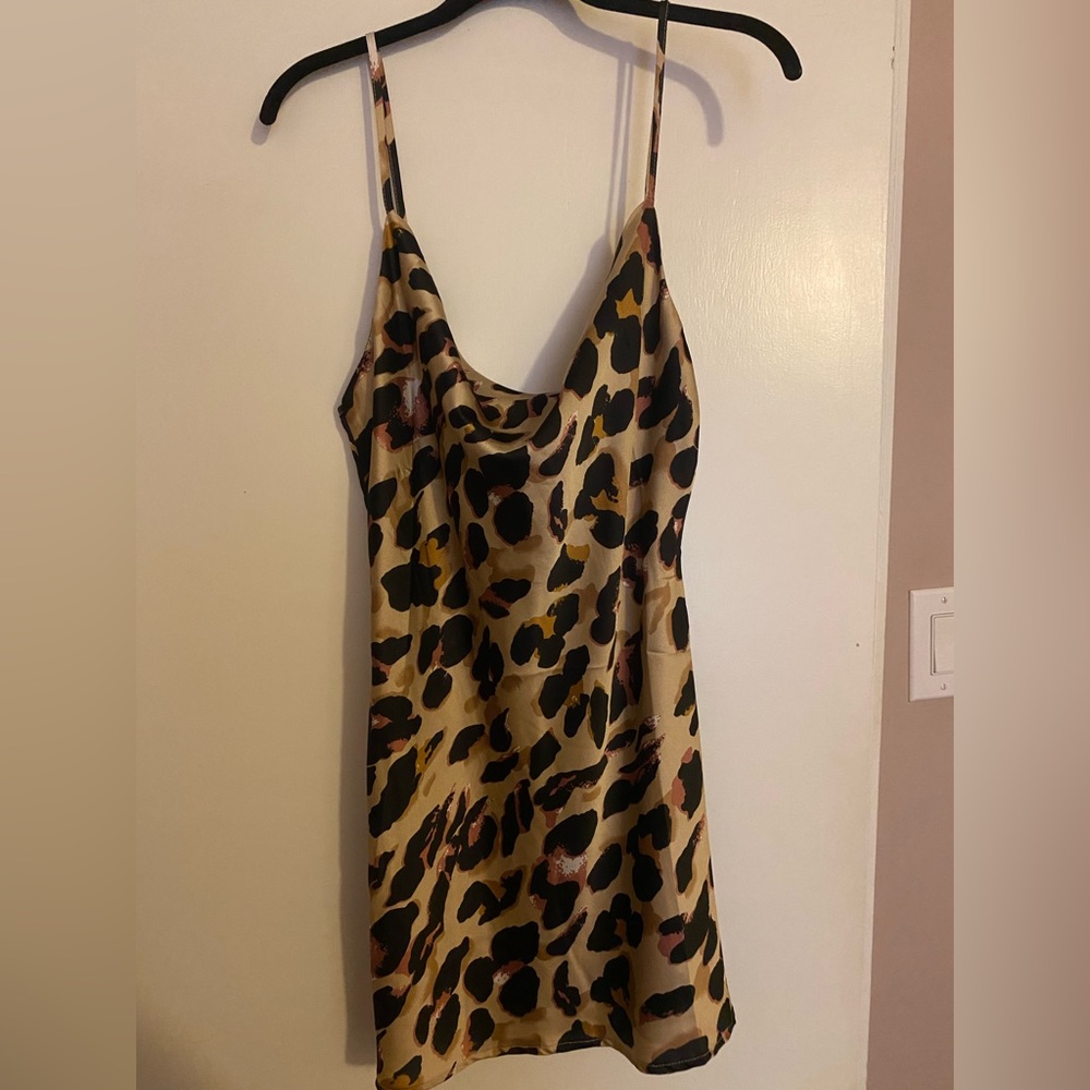 Never worn leopard print silk mini dress from fashion nova size medium
